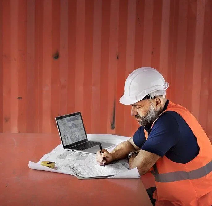 worker doing their some work in laptop